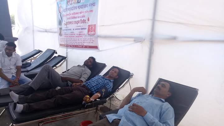 Group of volunteers with certificates